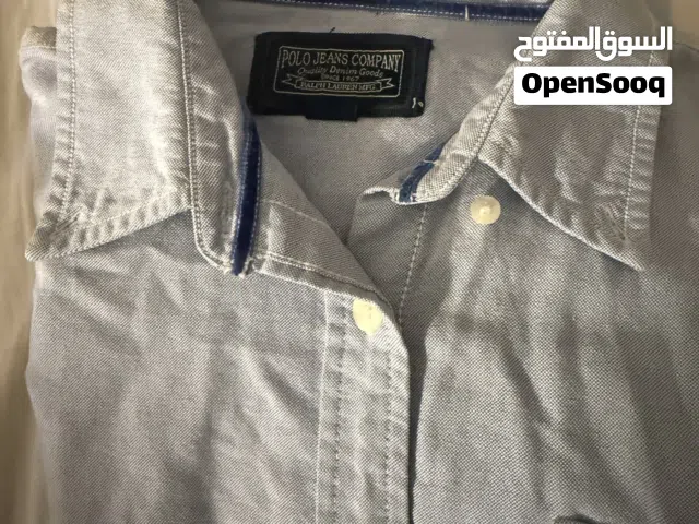 قميص بولو بأكمام طويله