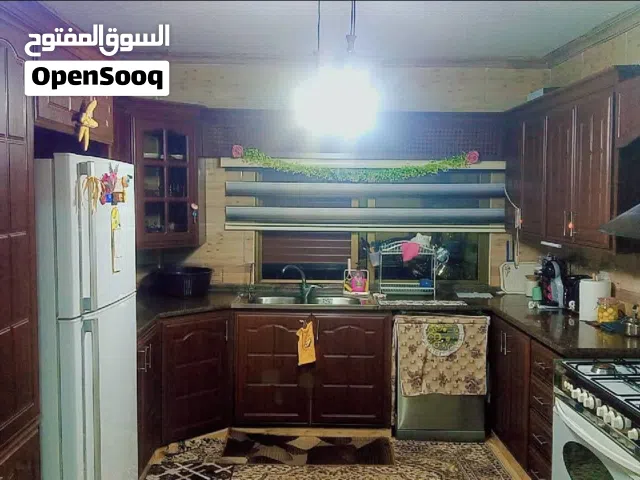 شقه ارضيه للبيع في الزرقاء الجديده