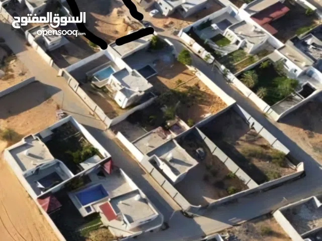ارض في تاجوراء بيئر العالم يوجد فيها بيئر مساحتها 555متر