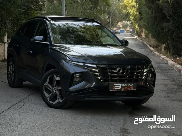 هونداي توسان 4/4 هايبرد plug-in ترخيص 2022 فل مع بانوراما  137000 كاش