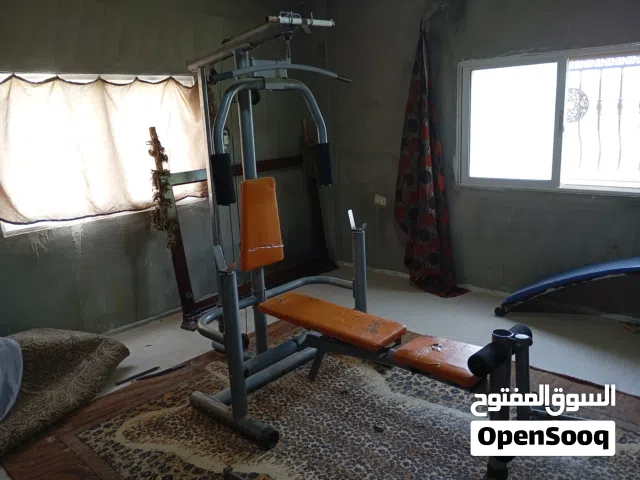 جيم منزلي متكامل (Full Home Gym): جهاز Multi-Gym + طقم بارات ودنابل وأوزان شاملة 110 kg