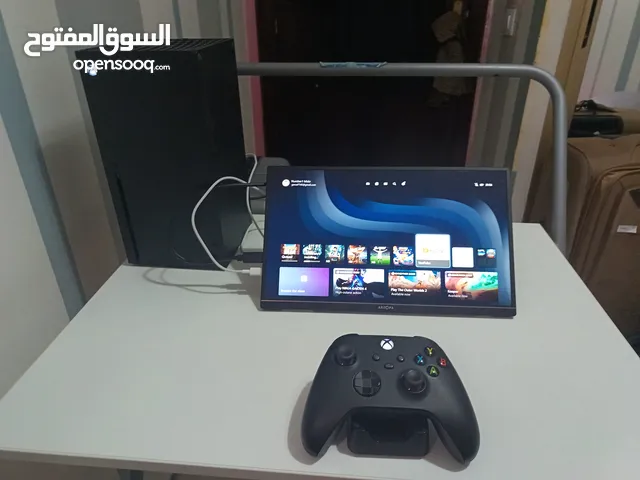 Xbox Series X with a collection of 6 games