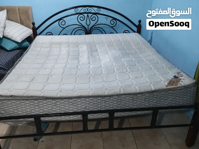 Steel cot with mattress