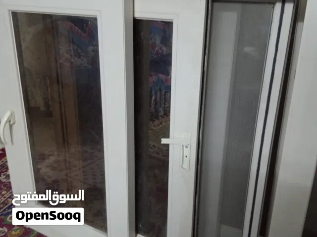 2 شباك و بلكونه للبيع بحاله جيده جدا  زجاج عاكس الضوء عازل للحرارة والصوت من اجود انواع ال PVC