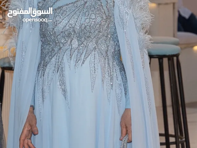 فستان سهرة ازرق فاتح للمحجبين و الغير محجبين مستعمل مرة واحدة خارج الكويت