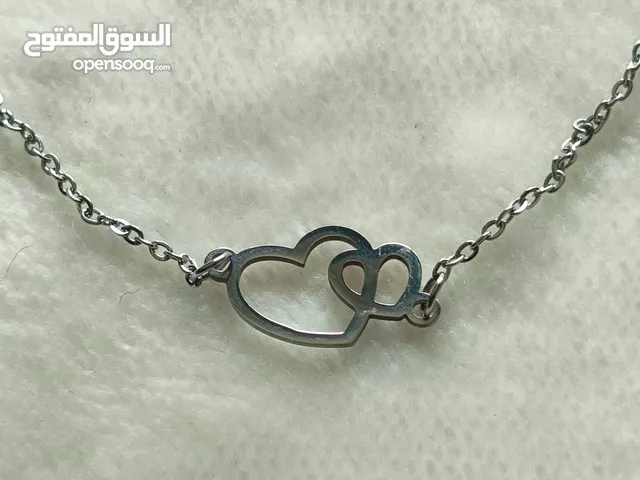 اسوارة ستيل مع تعليقة قلوب حب