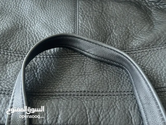 Black leather fossil hand bag