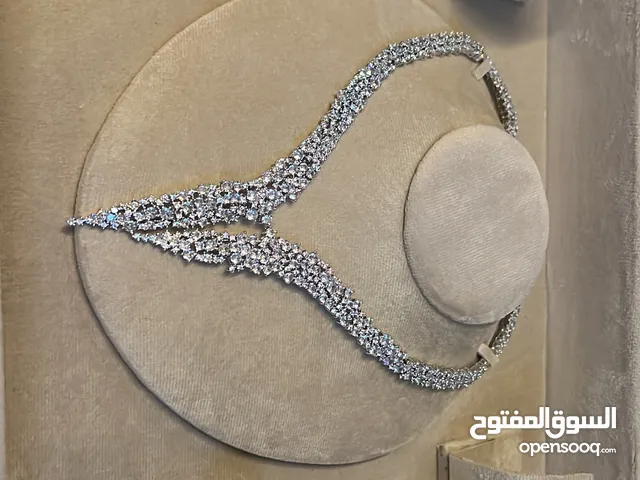 طقم مرصع بالزيركون يحاكي الألماس