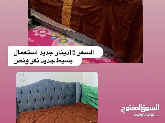 سرير لون رمادي