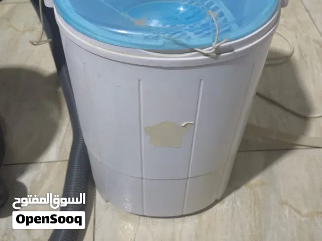مكناسة كهربائيه شغاله  وغساله صغيرة وياها نشافه وياها فرجه تتركب بغسل الاحذيه شغاله  وهاي كتب