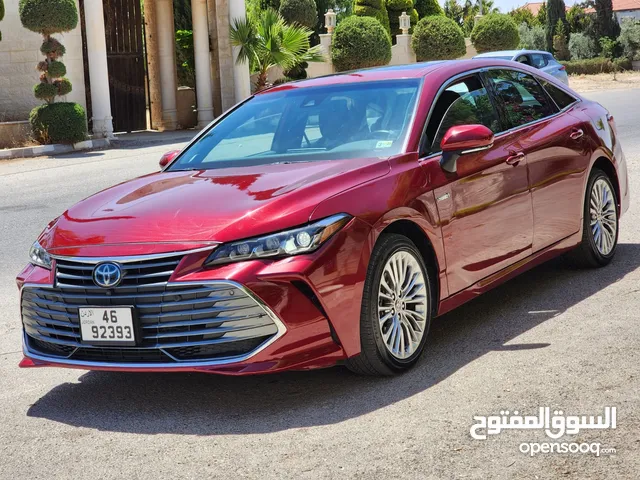 تويوتا افالون لون خمري حره جديد باسم المستورد 2021 فحص 3 جيد أعلى صنف بالاضافات بطاريه ليثيوم بسعر