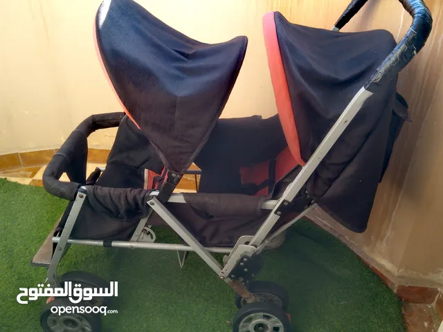 عربة توئم اطفال