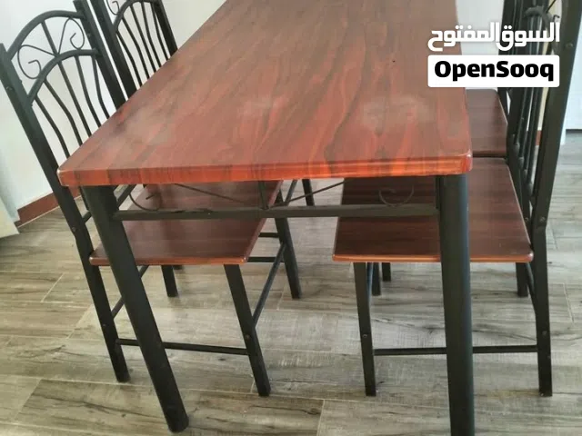 طاولة مع كراسي في الداخل أو في الخارج external iron and wood table with 4 chairs