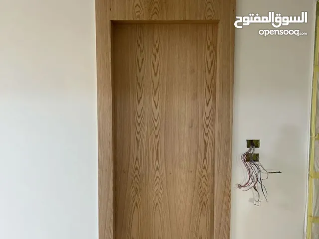 ابواب خشبيه ابواب قشرة جوز ابواب داخليه الرياض
