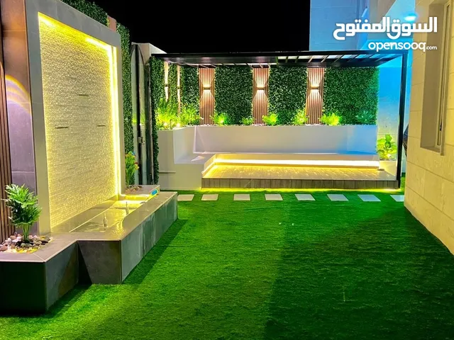 تنسيق حدائق العين