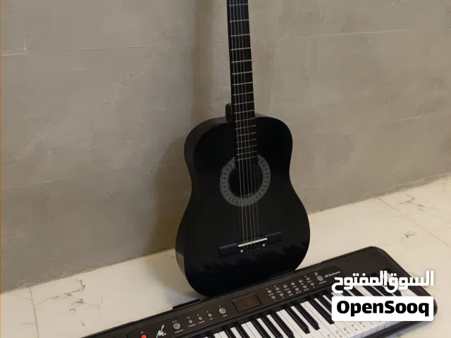 كيتار مع بيانو اصلي بسعر مناسب