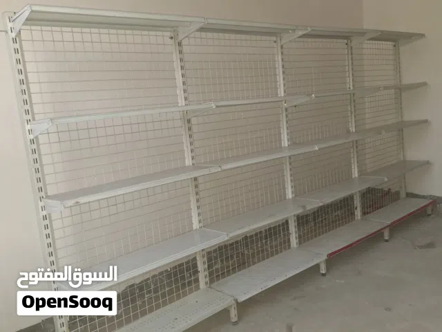 غراض محل اسواق للبيع رفوف جانبية وسفينة وسطية رف حلويات مكاني بصرة