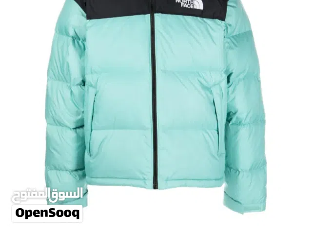جاكيت ماركة THE NORTH FACE جديد وارد اميركا لون ازرق فاتح واسود صناعة كمبوديا قياس لارج