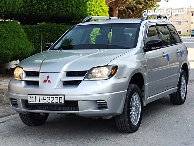 ميتسوبيشي آوتلاندر اوتوماتيك 2003 توب نظافة بسعرررر مميززز محرك 2400cc
