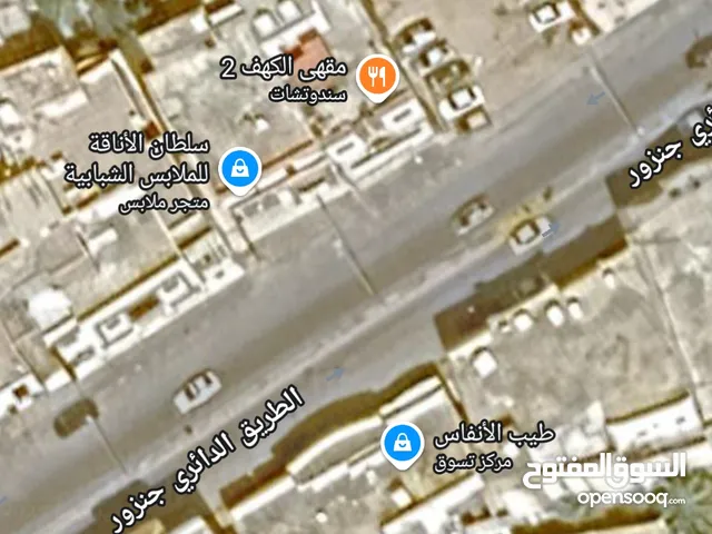 مبنى مقهى الكهف الدور الارضي والدور الثاني شقق للايجار