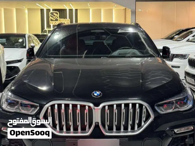 Bmw x6 بي ام في  موديل 2021  محرك 3000 لونها الخارجي اسود  والداخل احمر واسود