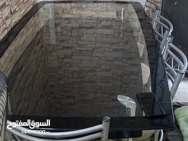 طاولة سفرة زجاج طابقين ولا خدش معها كراسي 4 الرجاء الجاد الشراء عدم التبخيس طول 180 عرض 100