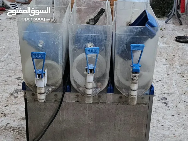 ماكنة سلاش وماكنة عصير برتقال طبيعي