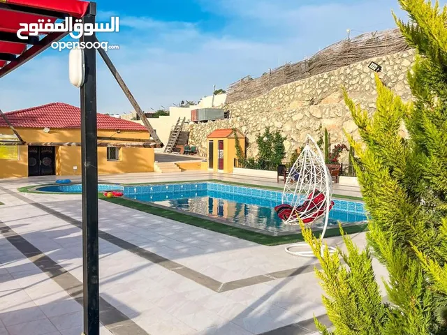 مزرعة وشاليه اركان جرش _خلف جامعة فيلادلفيا _تبعد عن دوار صويلح ربع ساعة