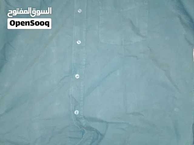 قميص بزراير كوم طويل