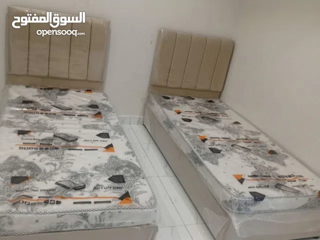 سرير مع مراتب