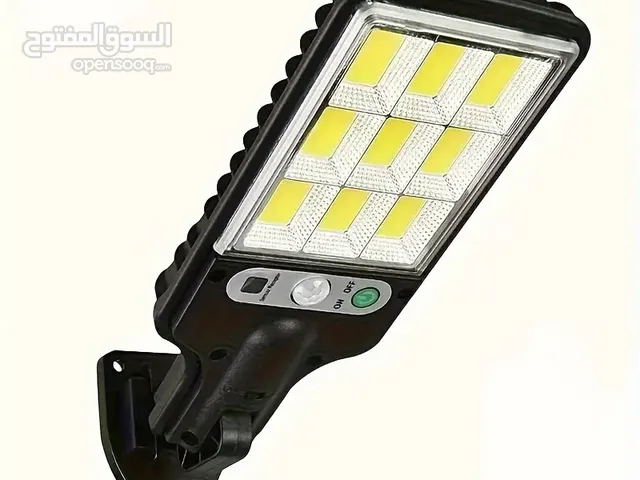 مصابيح الحركة الشمسية الجديدة مع جهاز تحكم عن بعد، مصابيح أمان مدعومة بألواح شمسية،