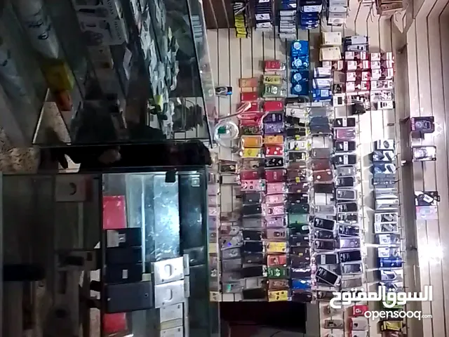 للبيع ديكور محل هواتف كامل مع السق والجانبيه والارفف والطاولات والإضاءة