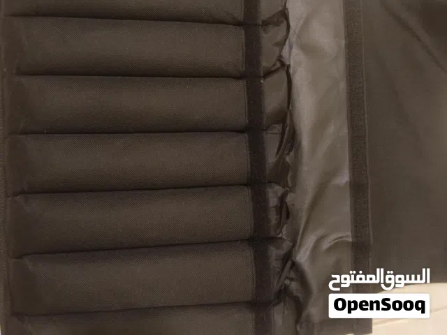سترة أوزان 20 كيلو + سترابس بحالة شبه جديدة للبيع