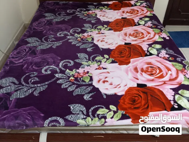 King-size bed with a pocket spring mattress and pillow top