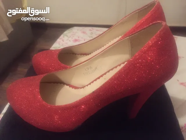 Red With Heels in Giza