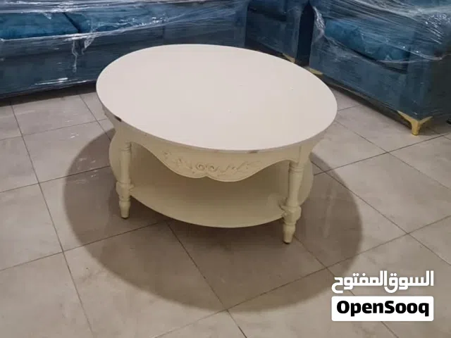 خزانة تلفاز خشب تقيل جدا بعجال مع رفين زجاج مع طاولة دائرية حجم كبير خشب تقيل مع طاولتين