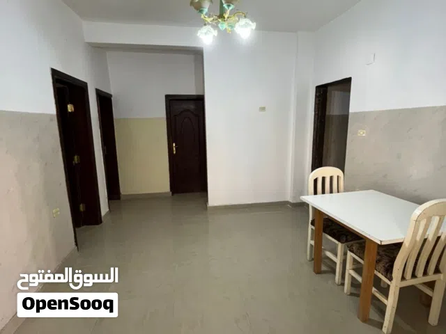 شقة دور ارضي للايجار بواجهتين في طريق الجامعة مقابل وزارة الزراعة