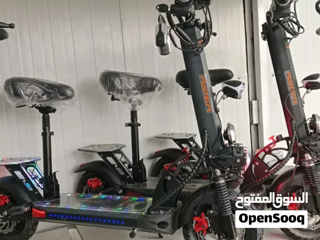 اسكوتر كهربائي مع شاحن جديد جوده ممتازه