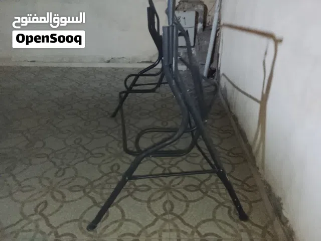 مرجيحه بحاله جيده لاكن ينقصها مقعد او فرش للجلوس عليه