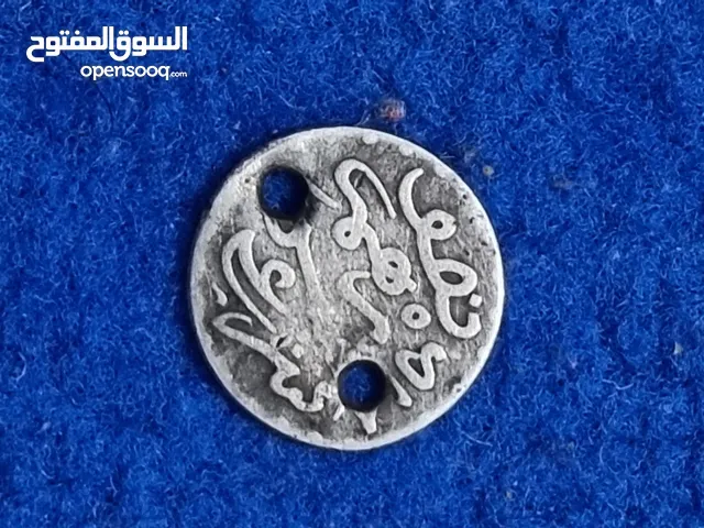 نصف درهم مغربي من سنة 1299 هجرية (1882 ميلادية تقريبًا)، يعد من القطع النقدية النادرة