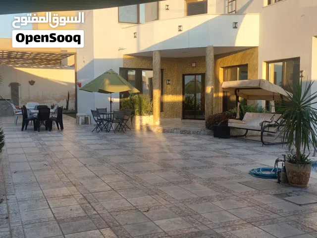 شاليهين مميزين منفصلين   140 الف دينار  بمنطقة فلل او البدل ع شقق