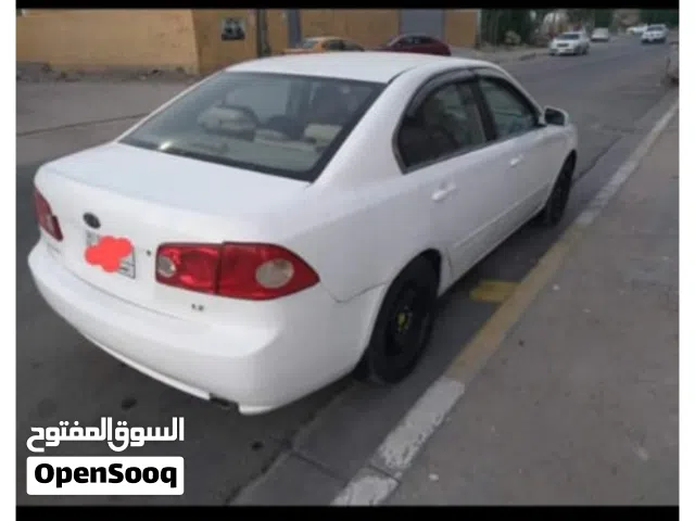 رقم ثلاثي بصره خصوصي أ مع سياره نوعيه كيا اوبتيما 6 سلندر أمريكي