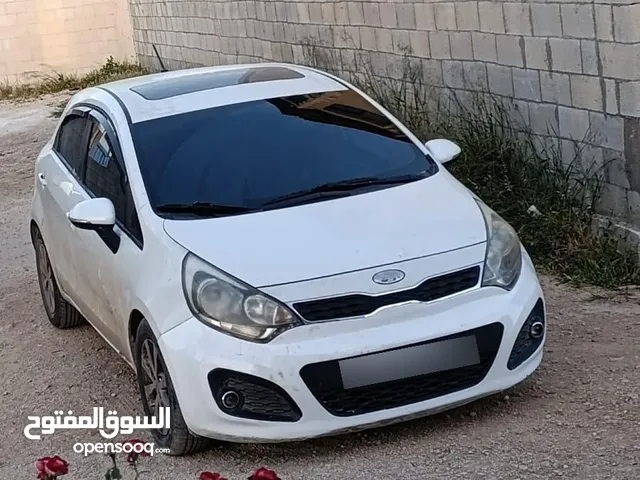 كيا برايد للبيع 2013 ديزل جير عادي ماطور 1400 ترخيص وتأمين شامل لشهر 1 /2026  اصل برايفت فل اضافات ل