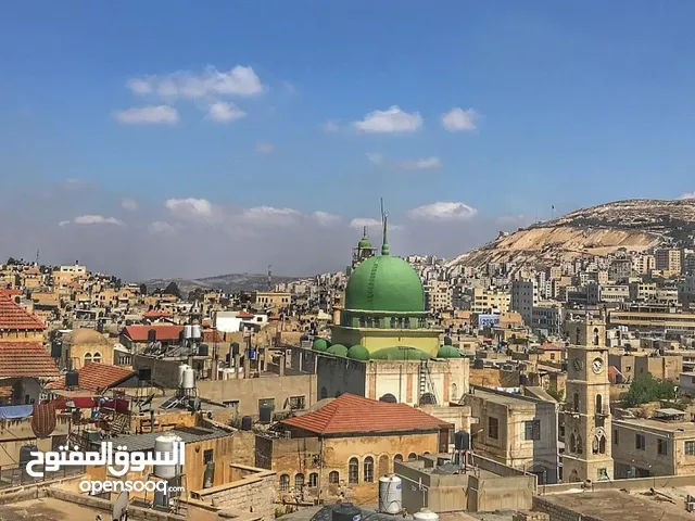 محل اومخزن بجانب حلويات القصى
