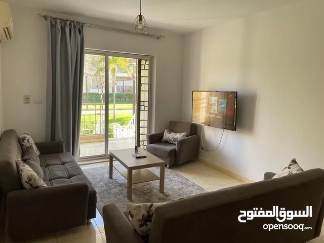 شقه ارضي بحديقه للايجار المفروش بمدينتي