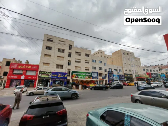 محل تجاري دورين مساحة 120 م ع شارع الكرامه بعد دوار الثقافه  مقابل مطعم الداخون وأسواق الخضار ......