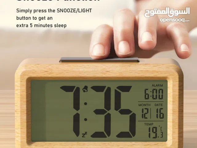 -  ساعة منبّه خشبية ذكية تصميم أنيق بلمسة خشبية وشاشة كبيرة واضحة.