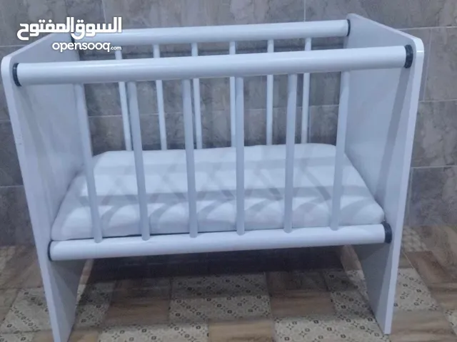 مستلزمات اطفال عرباية اطفال + سرير بيبي + دبدوب زهري + دبدوب احمر للبيع