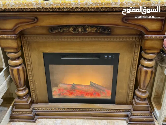 مدفأة كهربائية مع ديكور لهب ليد وستاند تلفزيون جديد جداً