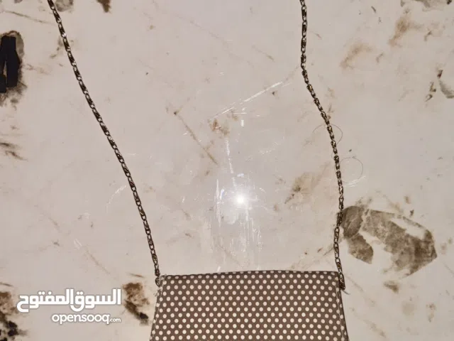 Mini brown bag with leather fabric